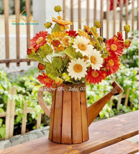Wooden watering can