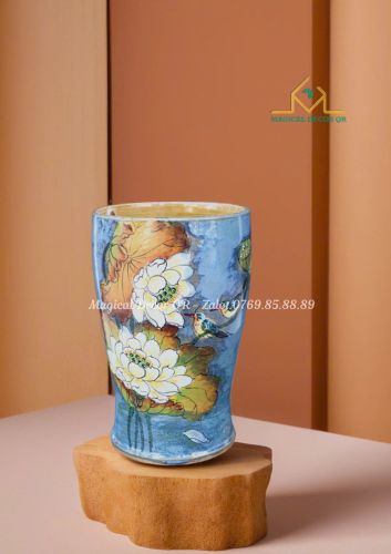 Small size ceramic vase of magnolia flowers