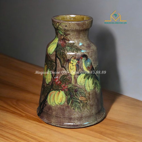 Lovebirds caressing the star fruit branch