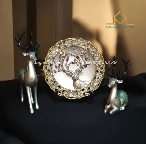 Set of golden and bronze deer